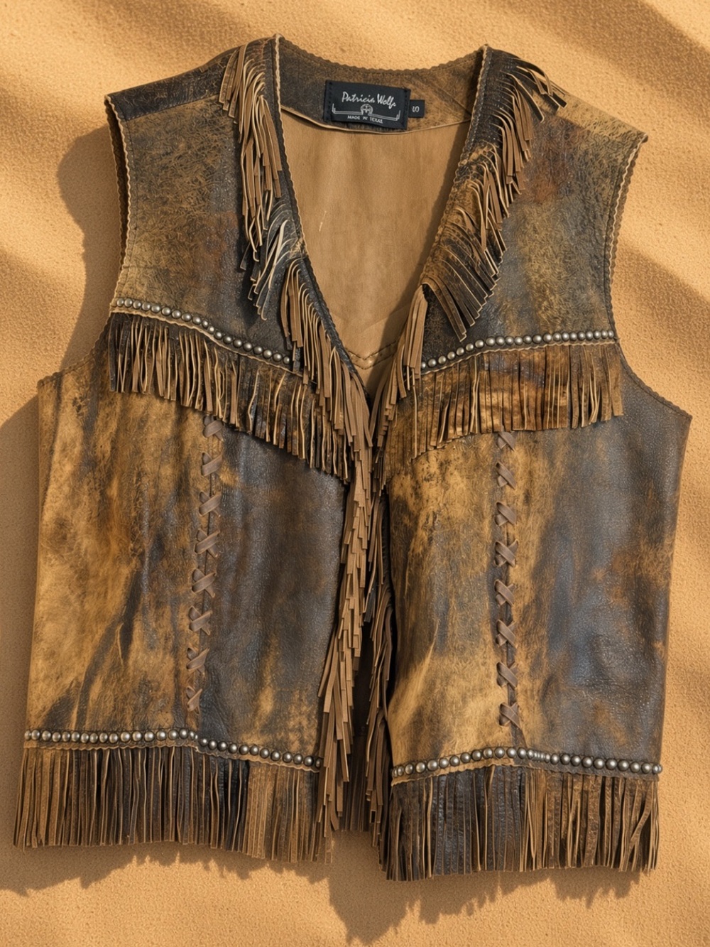Hand crafted Patricia Wolf studded leather fringe vest Small